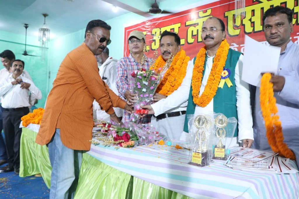 Guests being welcomed at a felicitation ceremony hosted by the firm